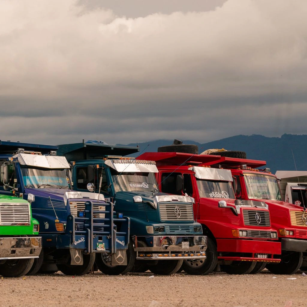 FleetPro commercial bay with multiple work trucks staged for tire rotations.