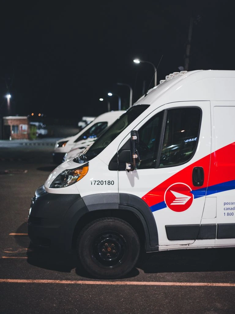 FleetPro commercial service bay with multiple trucks lined up for tire and brake service.
